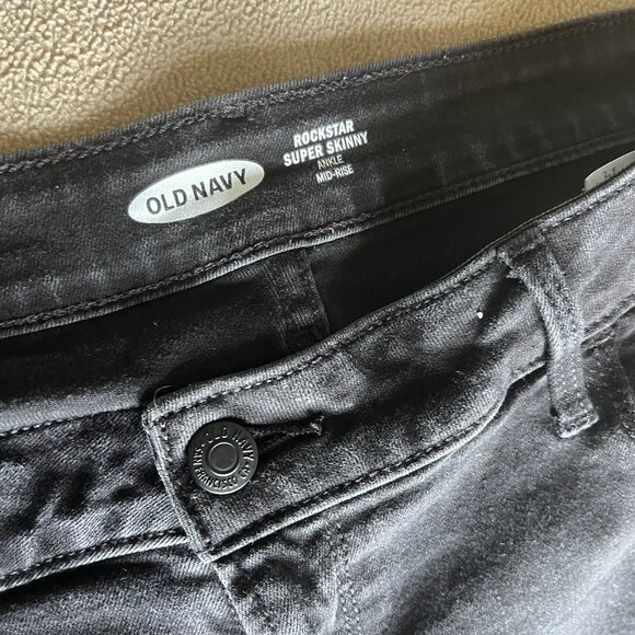 Old Navy - Rockstar Super Skinny Ankle Mid-Rise Distressed Black Jeans - Picture 5 of 8